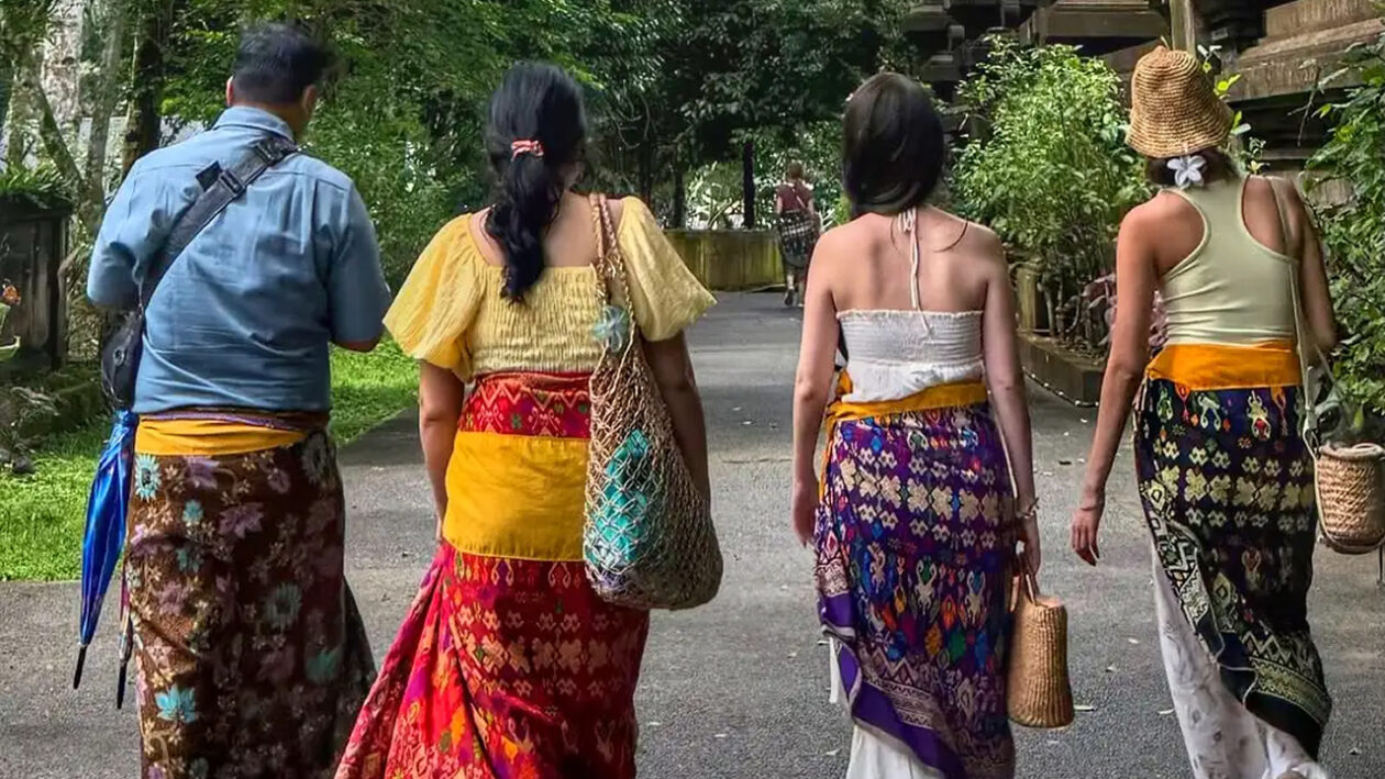 international tourist wear bali sarong