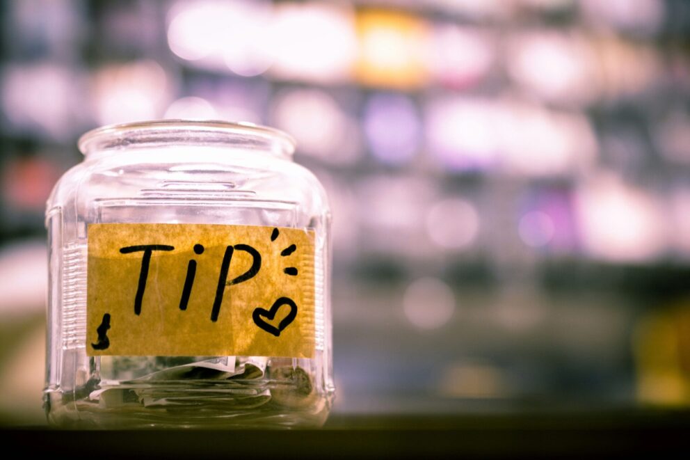 Tip jar filled with money